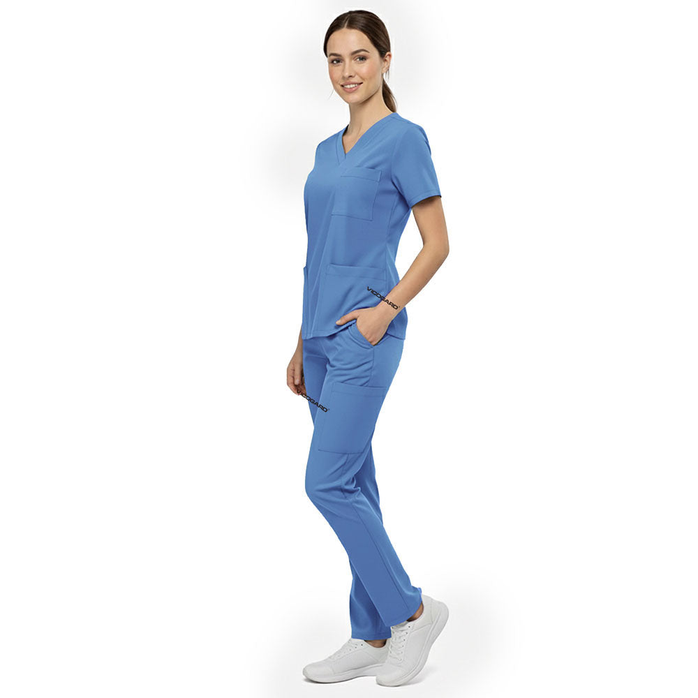 Side view of model using deep cargo pocket on Royal Blue scrub pants, showing spacious storage