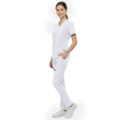 Side view of model using deep cargo pocket on White scrub pants, showing spacious storage for clinical tools