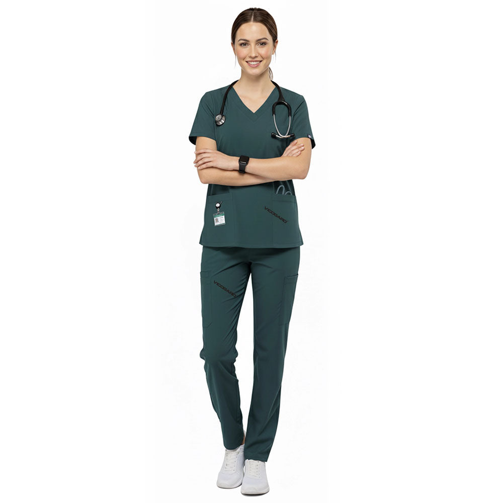 Dental professional wearing Turquoise performance scrubs ready for patient care