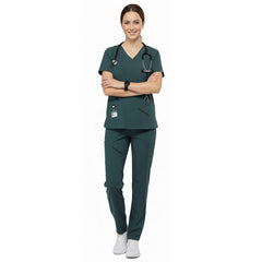 Dental professional wearing Turquoise performance scrubs ready for patient care