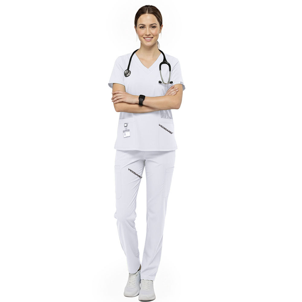 Nursing student wearing White performance scrubs ready for pinning ceremony or clinical rotations