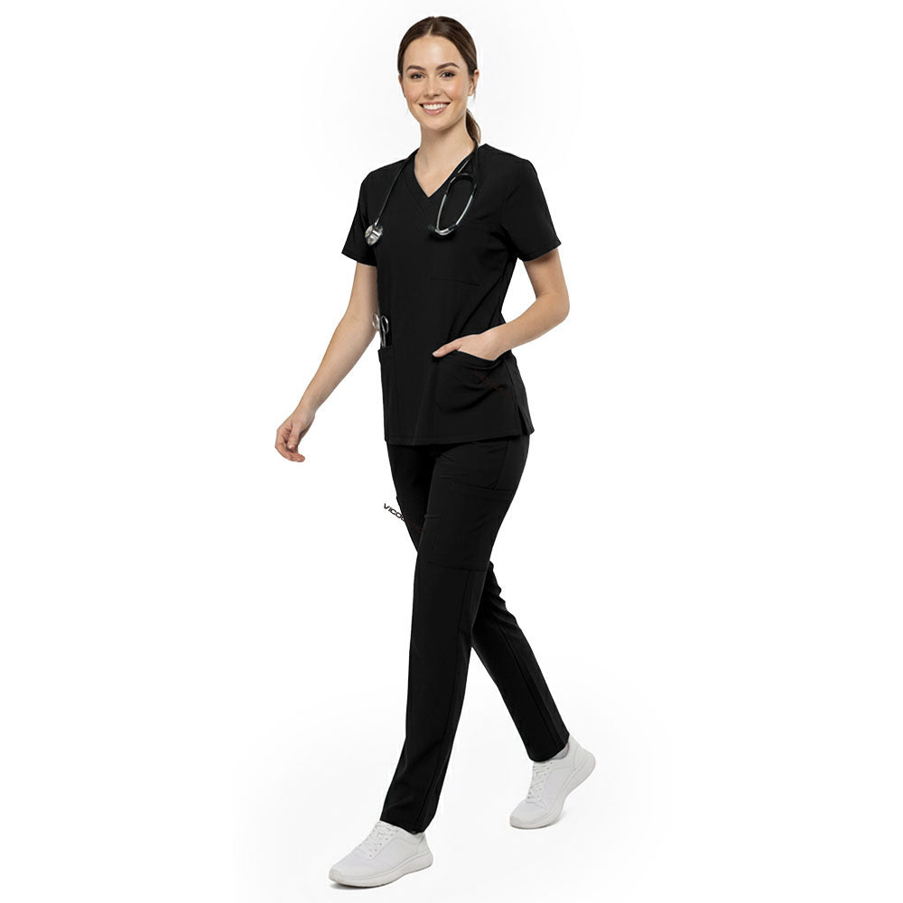 Professional reaching into chest pocket of Black V-neck scrub top, demonstrating easy access to pens