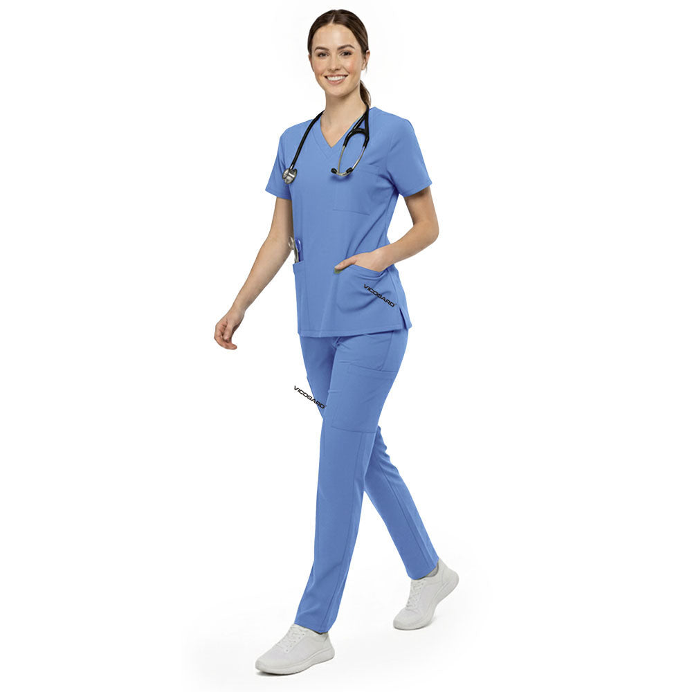 Nurse reaching into chest pocket of Royal Blue V-neck scrub top, demonstrating easy access