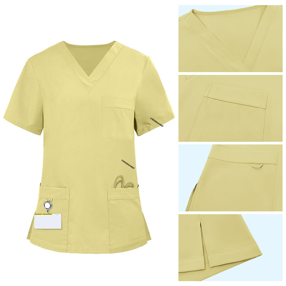 Detail of Cream Yellow scrub top pocket with functional bungee loop for hanging toys or IDs