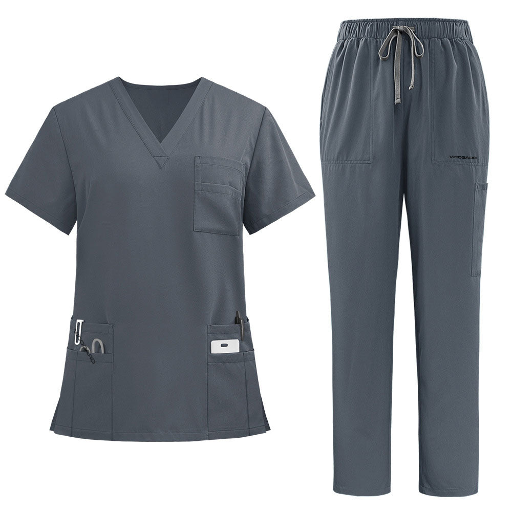 vicogard Pro Custom unisex scrub set in Heather Gray, arranged on a flat surface