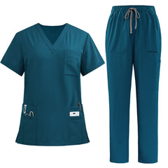 The vicogard Pro Custom scrub set in bright Caribbean Blue, laid flat