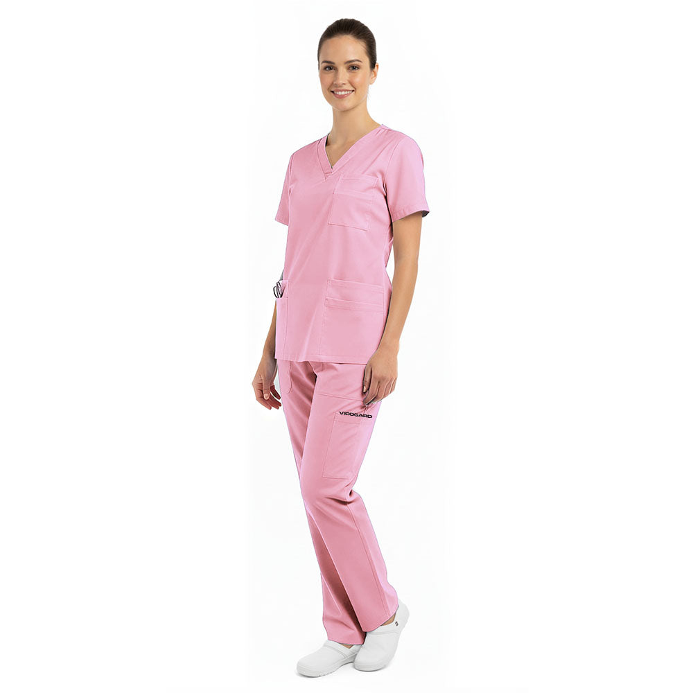 Model's side view showcasing the flattering fit of the Blush Pink Pro scrub set