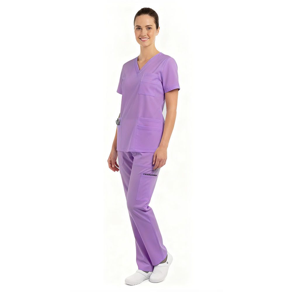 Side profile of model wearing the unique Purple Pro scrub set