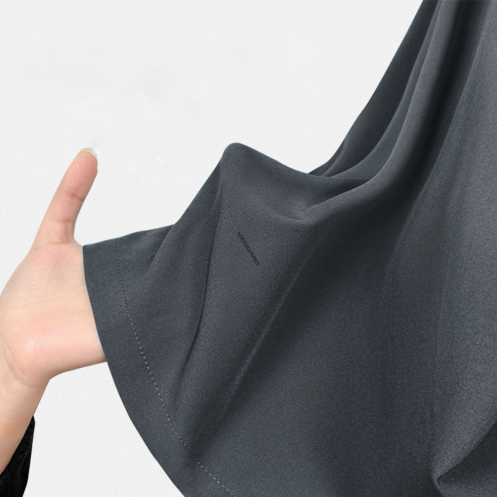 Textured close-up of the 4-way stretch Heather Gray fabric blend