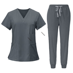 Flat lay of Gray scrub set model 71212, featuring V-neck top and jogger pants