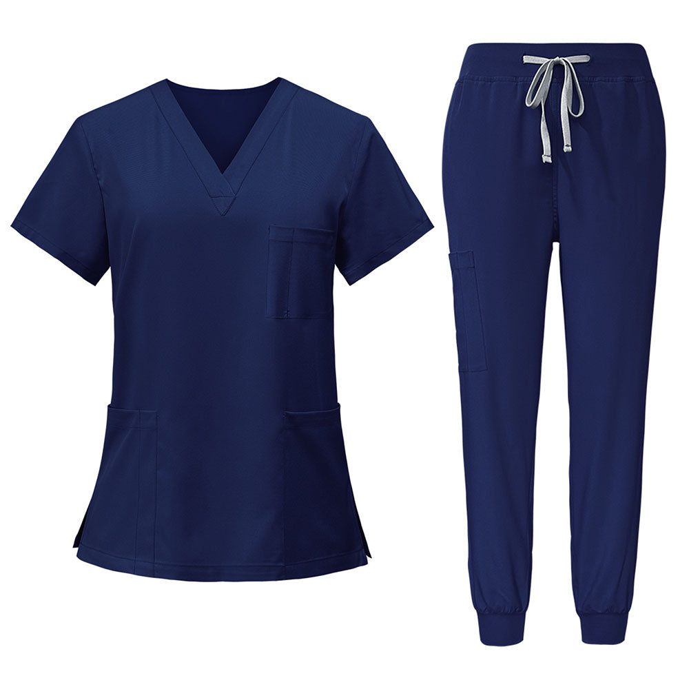 Flat lay of Navy Blue scrub set featuring V-neck top and jogger pants
