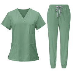 Flat lay of Mint Green nursing scrub set, including V-neck top and jogger pants