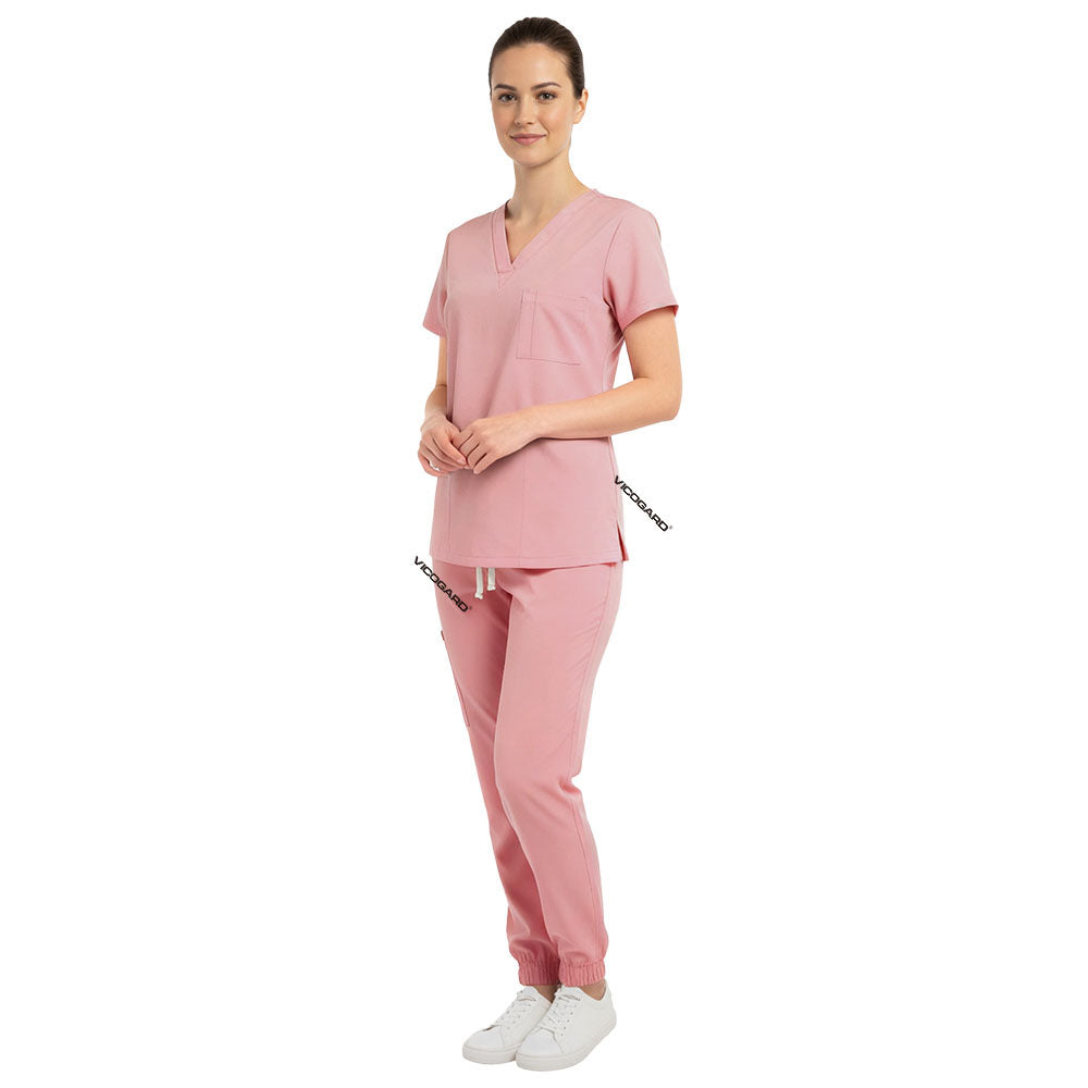 Side view of Pink scrub joggers showing flattering fit and cargo pockets