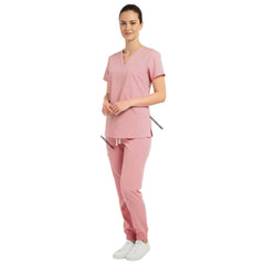 Side view of Pink scrub joggers showing flattering fit and cargo pockets