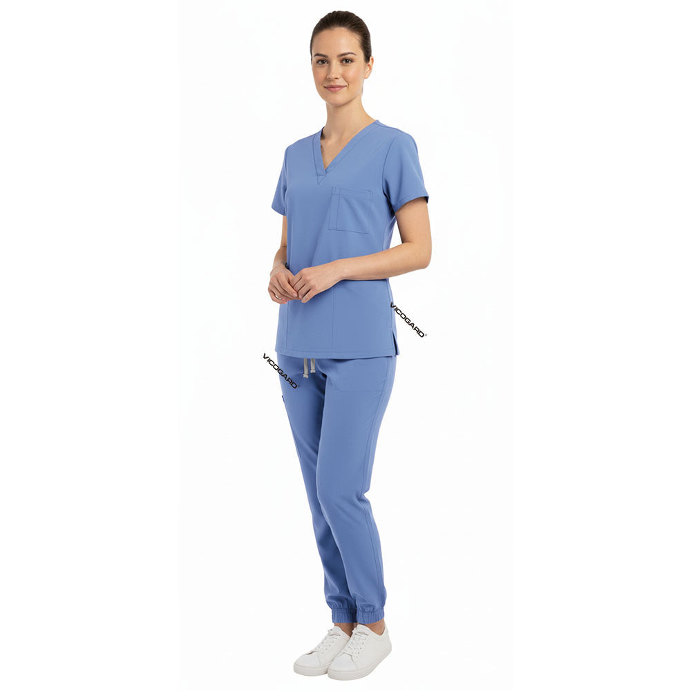 Side view of Ceil Blue scrub joggers showing athletic fit and deep cargo pockets