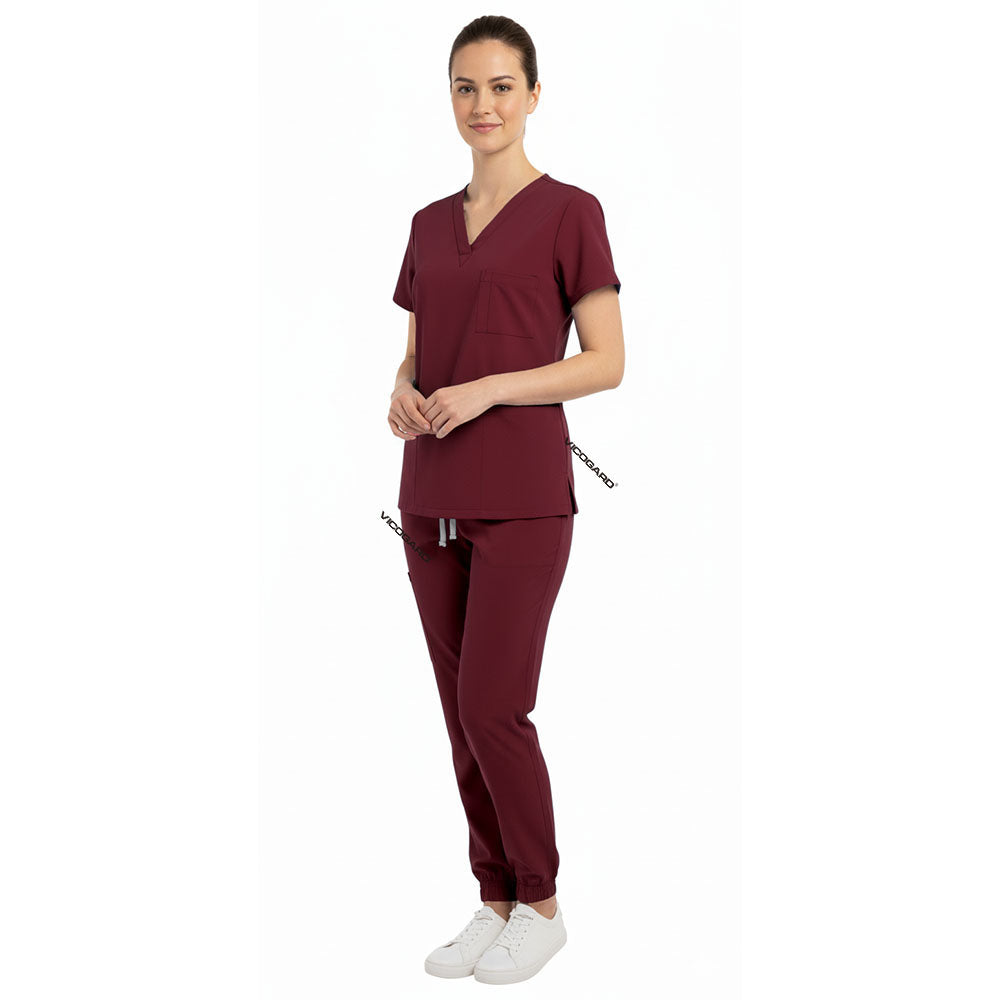 Side view of Burgundy scrub joggers showing athletic fit and deep cargo pockets