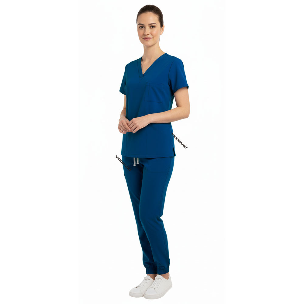 Side view of Caribbean Blue scrub joggers showing athletic fit and deep cargo pockets