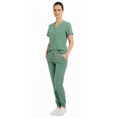 Medical professional using functional pockets on Vicogard stretch scrub pants
