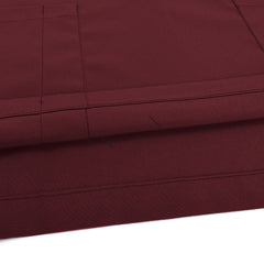 Close-up of Burgundy UltraSOFT fabric, wrinkle-resistant 94% polyester blend texture