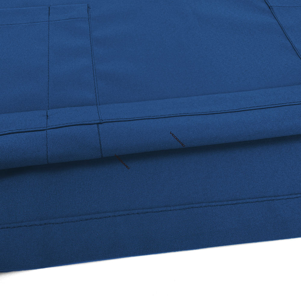 Close-up of Caribbean Blue UltraSOFT fabric, wrinkle-resistant 94% polyester blend texture