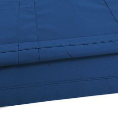 Close-up of Caribbean Blue UltraSOFT fabric, wrinkle-resistant 94% polyester blend texture