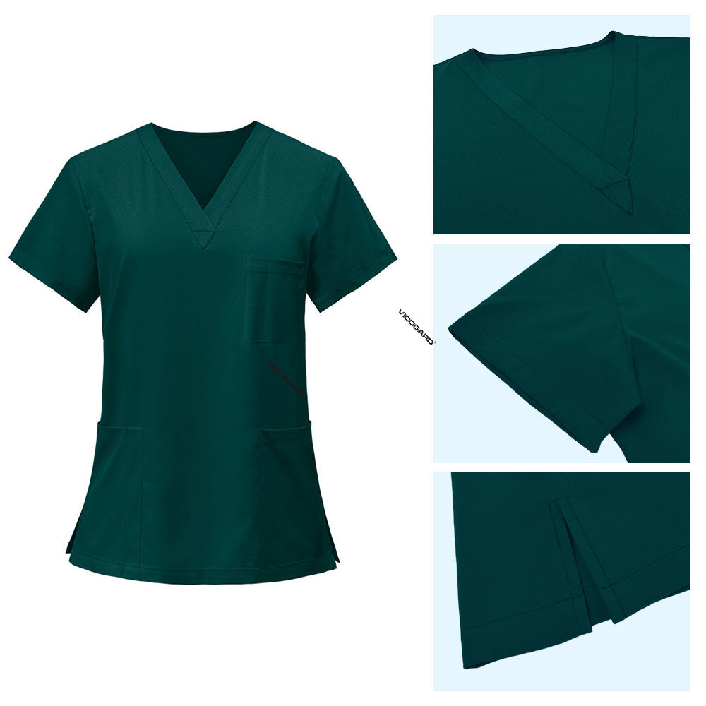 Detail of Hunter Green scrub top V-neckline and reinforced stitching
