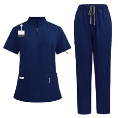 Flat lay of Galaxy Blue nursing scrubs featuring zipper mandarin collar top and cargo pants