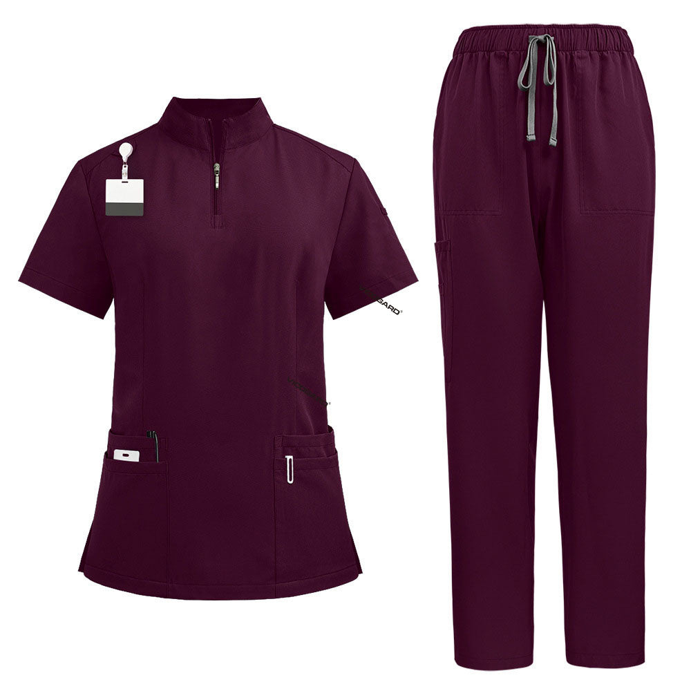 Flat lay of Wine colored scrubs featuring zipper mandarin collar top and cargo pants