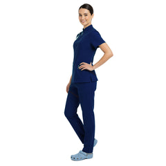 Side profile of Galaxy Blue deep color scrubs showing cargo pockets and athletic silhouette