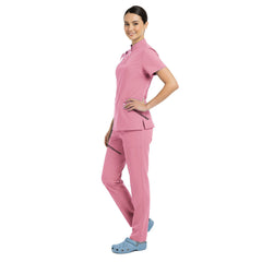 Side profile of Pink scrub set showing athletic silhouette and deep cargo pockets
