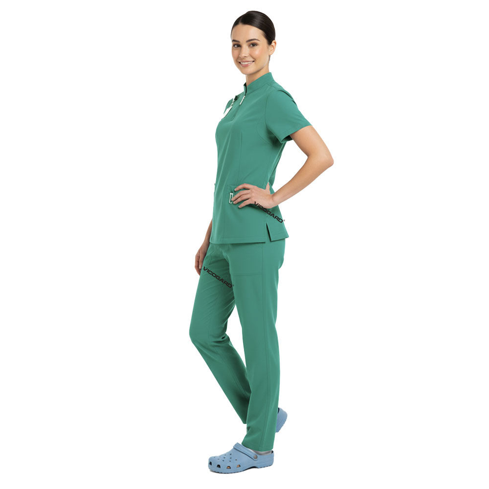 Side profile of Turquoise bright scrubs showing cargo pockets and athletic silhouette