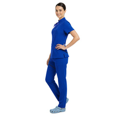 Side profile of Royal Blue scrub set showing athletic silhouette and deep cargo pockets