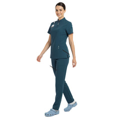 Full body display of Caribbean Blue Vicogard scrubs, ideal outfit for vets and nurses