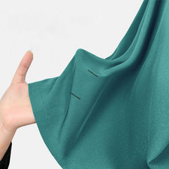 Close up of Turquoise UltraSOFT fabric, stain-resistant 4-way stretch texture