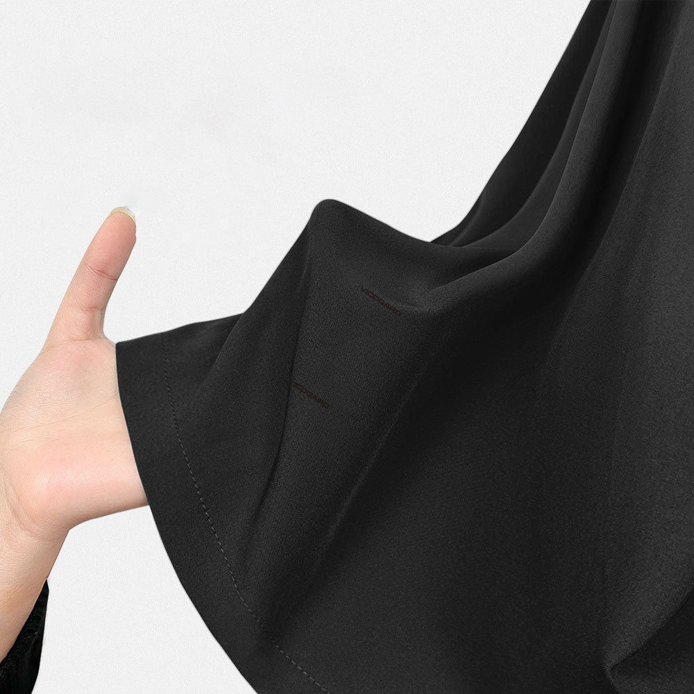 Close up of Black UltraSOFT fabric texture, fade-resistant 4-way stretch polyester blend