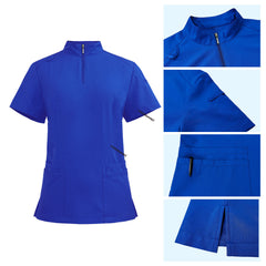 Detail of Royal Blue scrub top featuring half-zip neckline, shoulder badge loop, and chest pockets